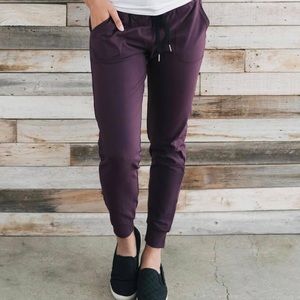 Zyia plum unwind joggers size large.  New with tag